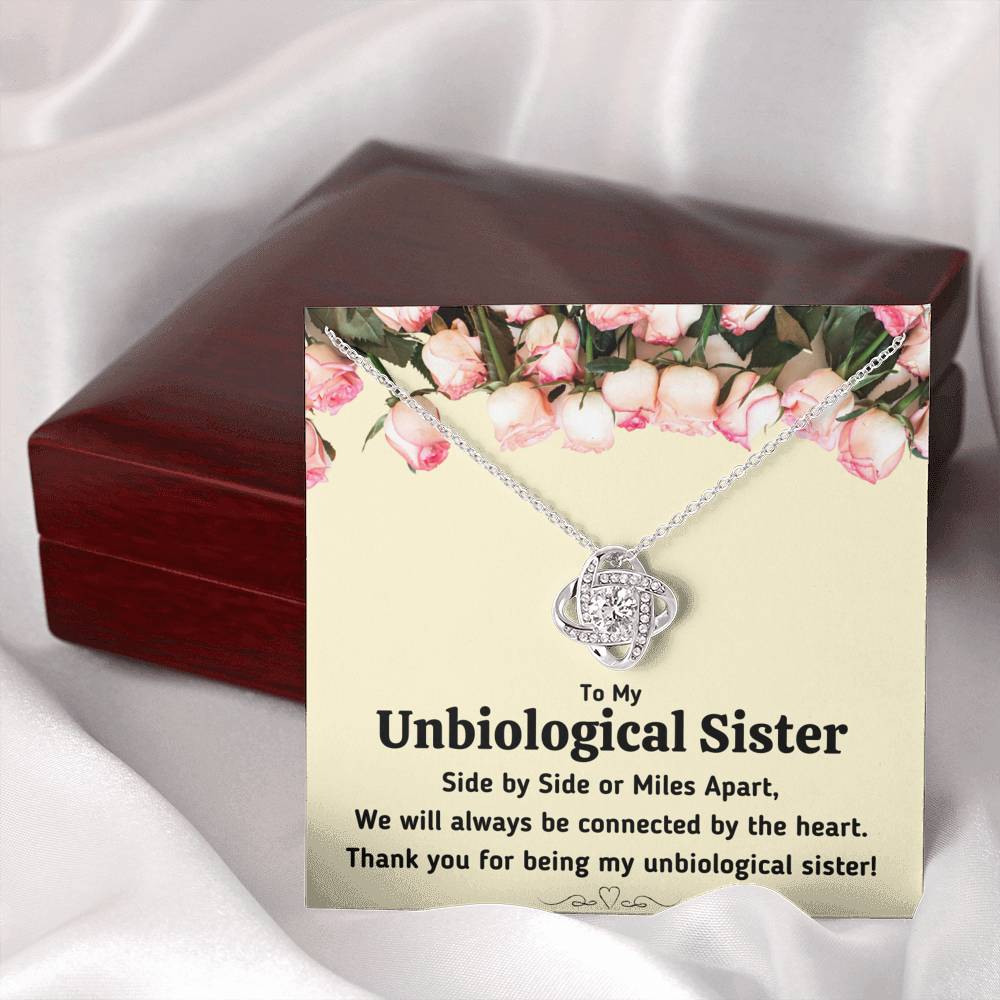 TO MY UNBIOLOGICAL SISTER "CONNECTED BY THE HEART" LOVE KNOT NECKLACE GIFT SET - ON CLOUD NINE GIFTS
